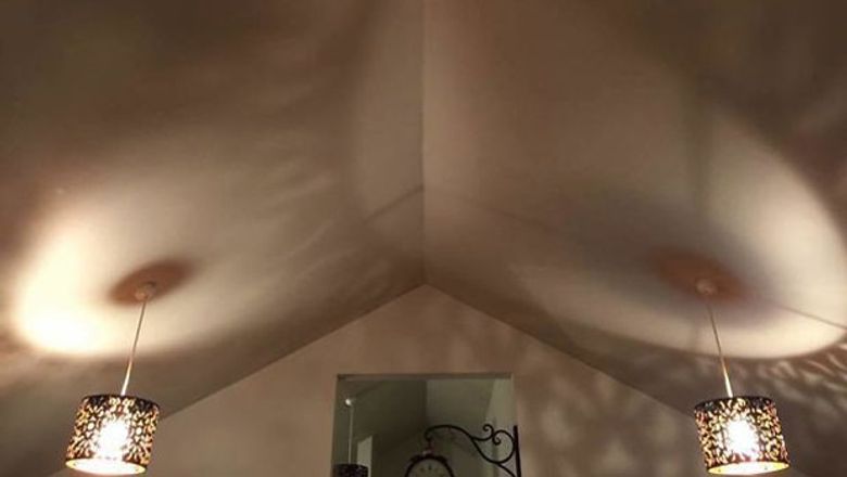symmetric lighting or ceiling breasts?