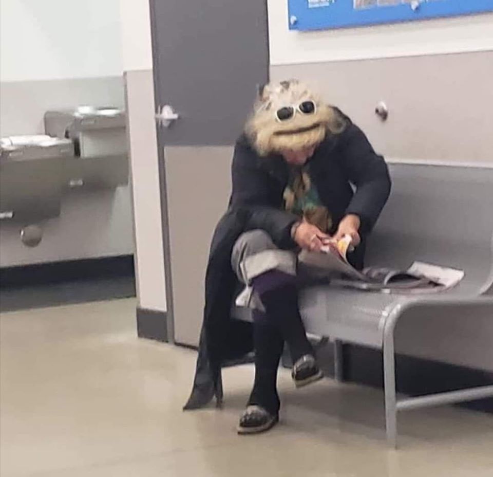 muppets are real, lady sitting on bench with head down has familiar hair