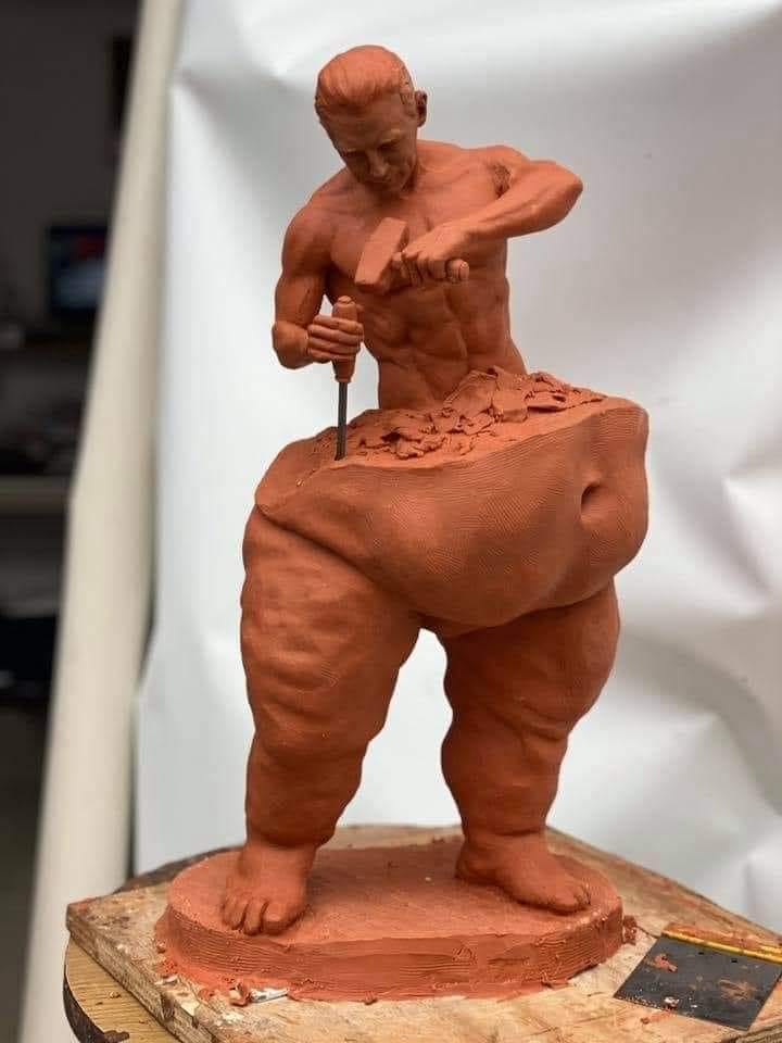 the hardest work is work on yourself, sculpture of man chiseling himself down from an obese body to a muscular body