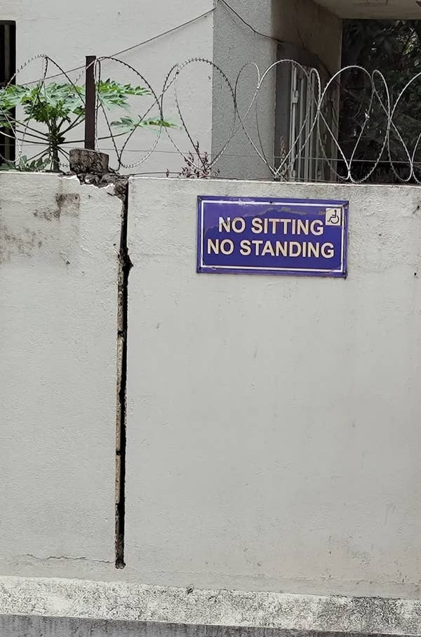 no sitting, no standing, funny signs, confusing signs, what